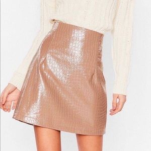 NWT
BEIGE Faux Leather Mini Skirt
